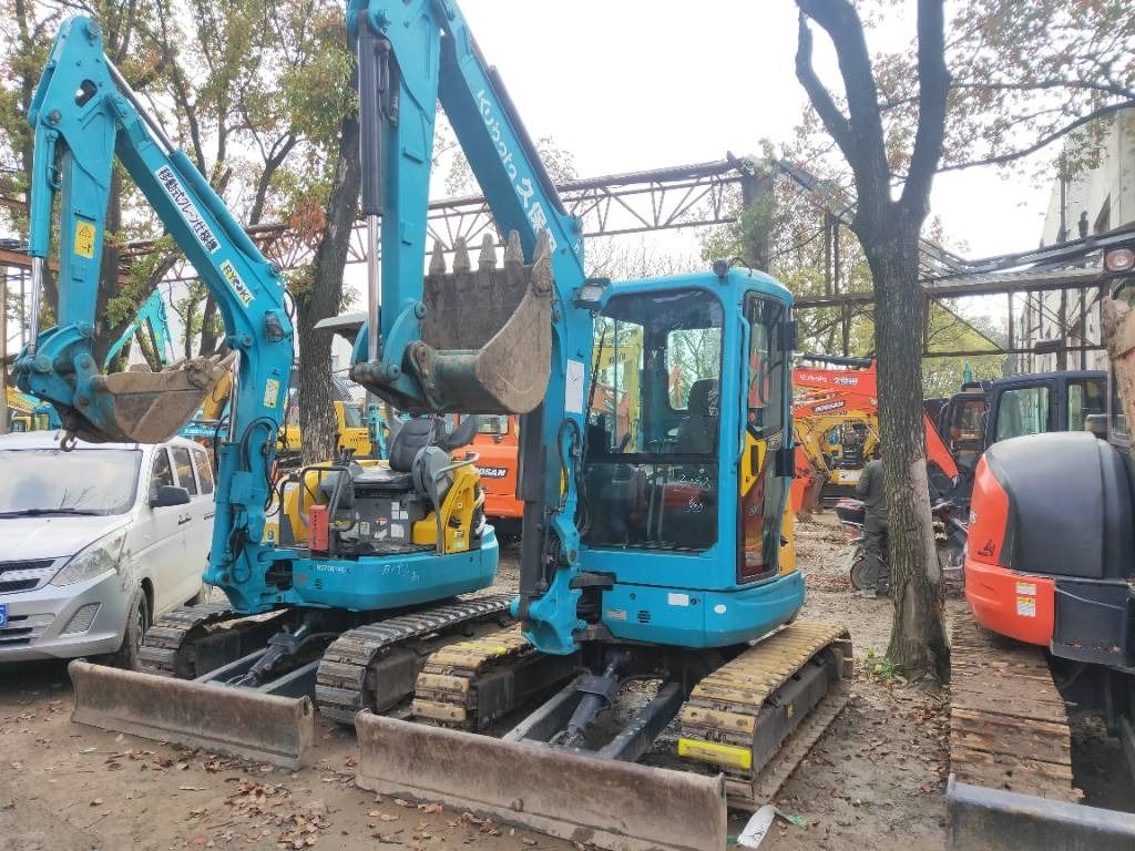 2023 Kubota KX135-3S mini excavator, front three-quarter view