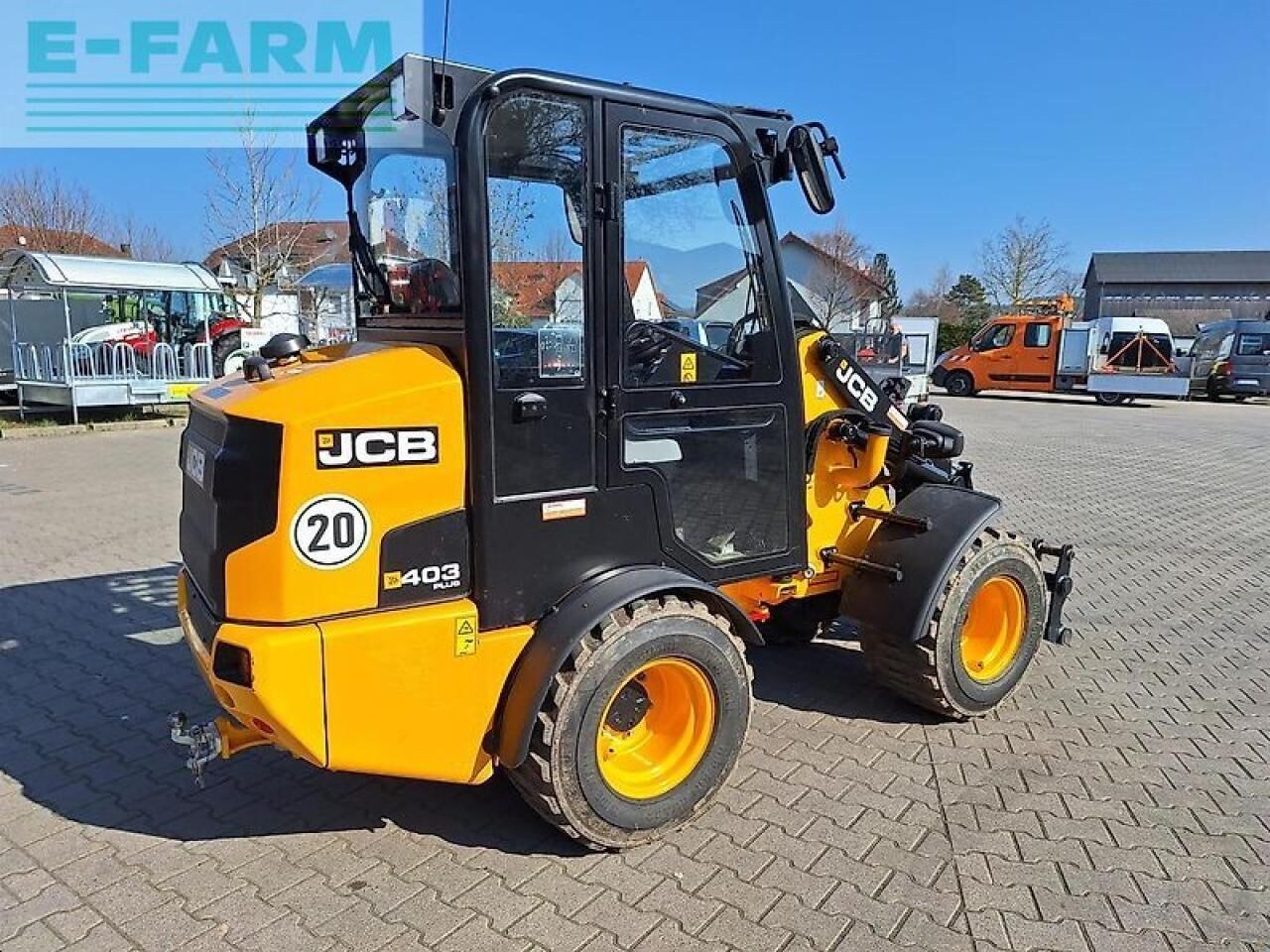 2024 JCB 403PLUS wheel loader, rear three-quarter view