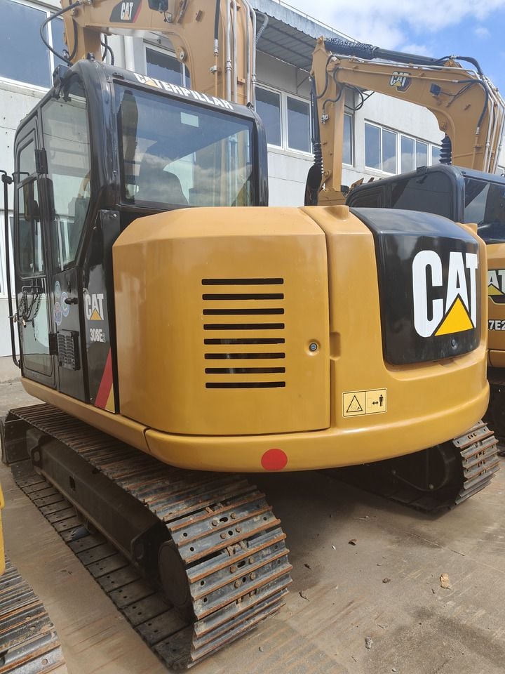 Caterpillar 308E crawler excavator, rear three-quarter view