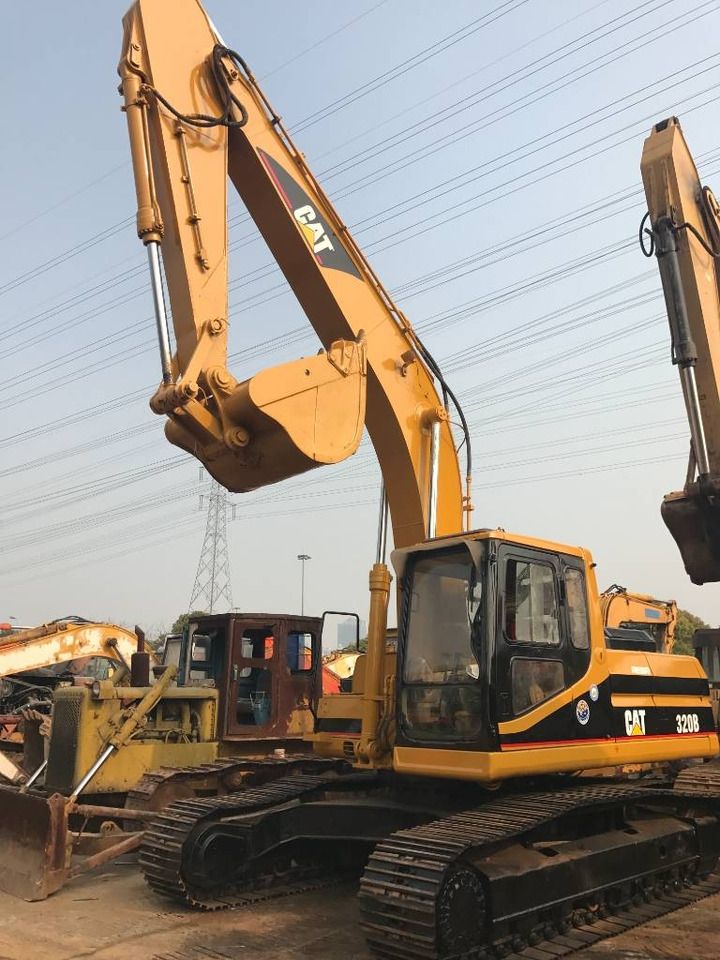 2023 Caterpillar 320B crawler excavator, side view