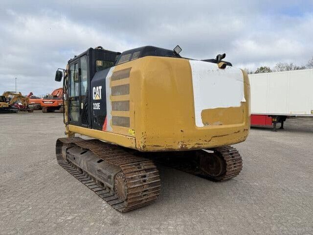 2012 Caterpillar 320E crawler excavator, rear three-quarter view