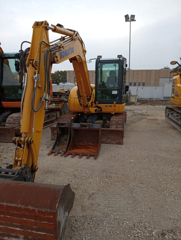 2023 Komatsu PC80MR-5 crawler excavator, front three-quarter view