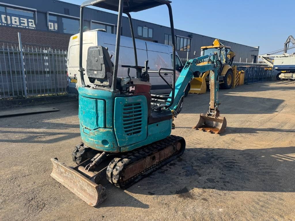 2017 Komatsu PC16R-3HS mini excavator, rear three-quarter view