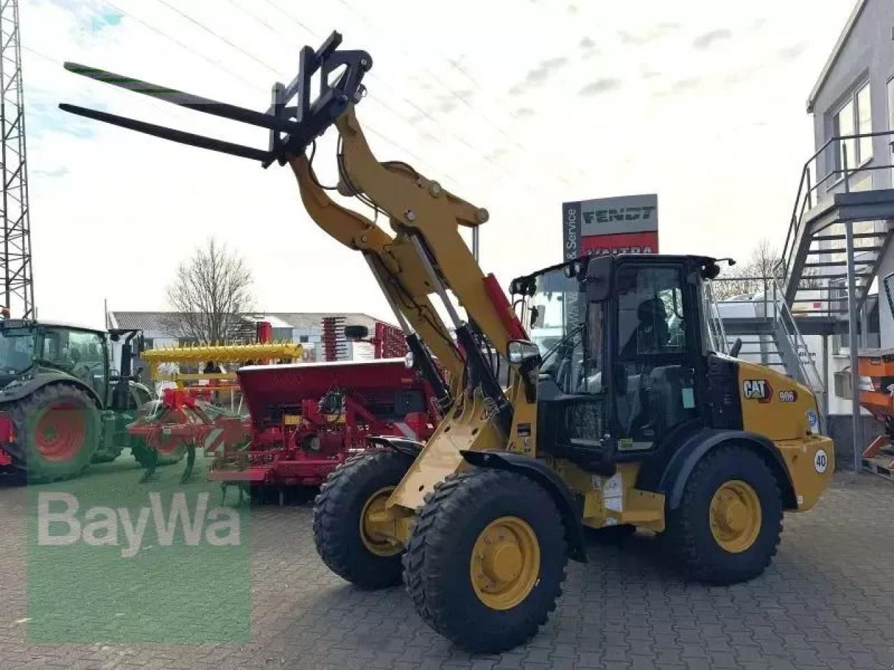 2022 Caterpillar 906 wheel loader, front three-quarter view 2022 Caterpillar 906 wheel loader, front three-quarter view