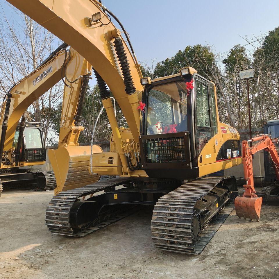 2023 Caterpillar 320C crawler excavator, front three-quarter view