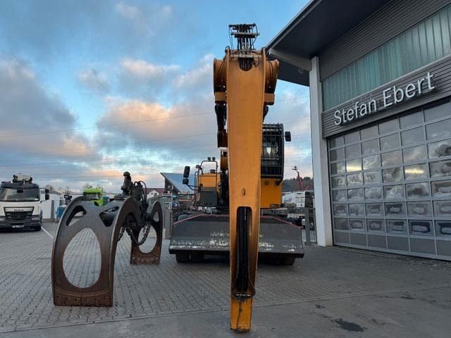2020 Liebherr LH50M TIMBER material handler, front view with detached timber grapple