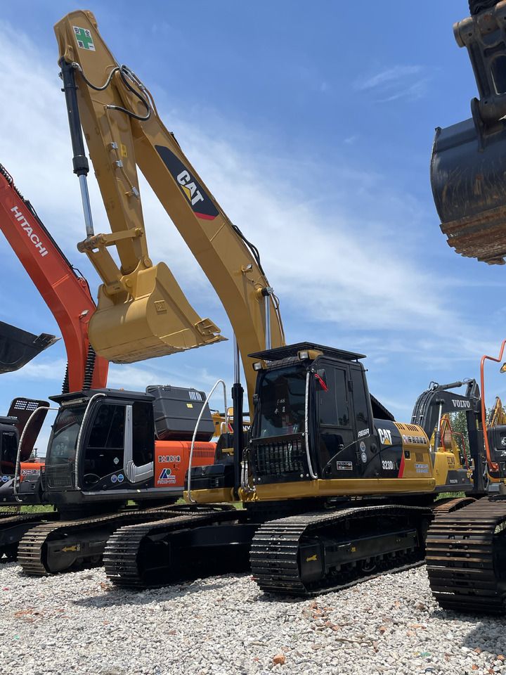 2023 Caterpillar 323D2L crawler excavator, front three-quarter view