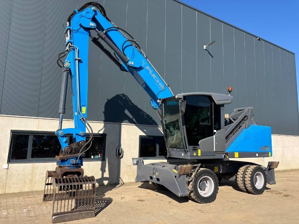 2022 Fuchs MHL320F material handler, front three-quarter view