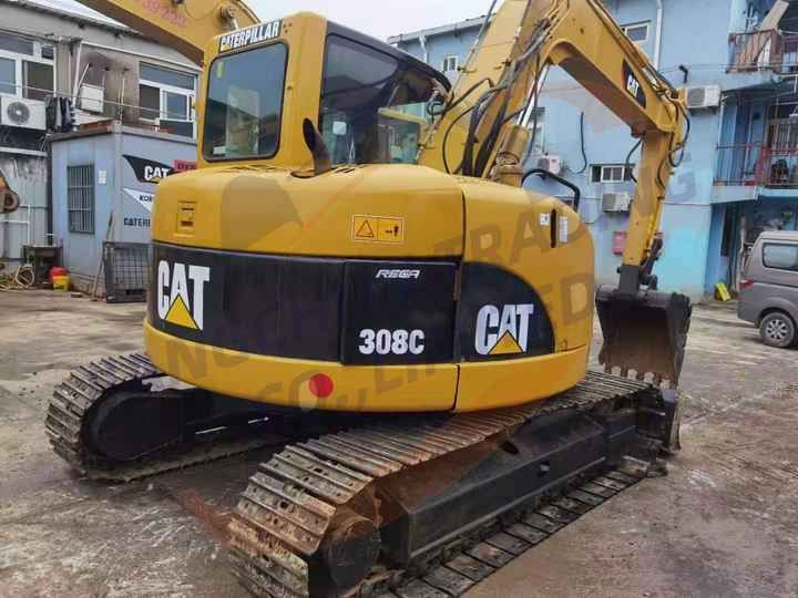 2018 Caterpillar 308C mini excavator, rear three-quarter view