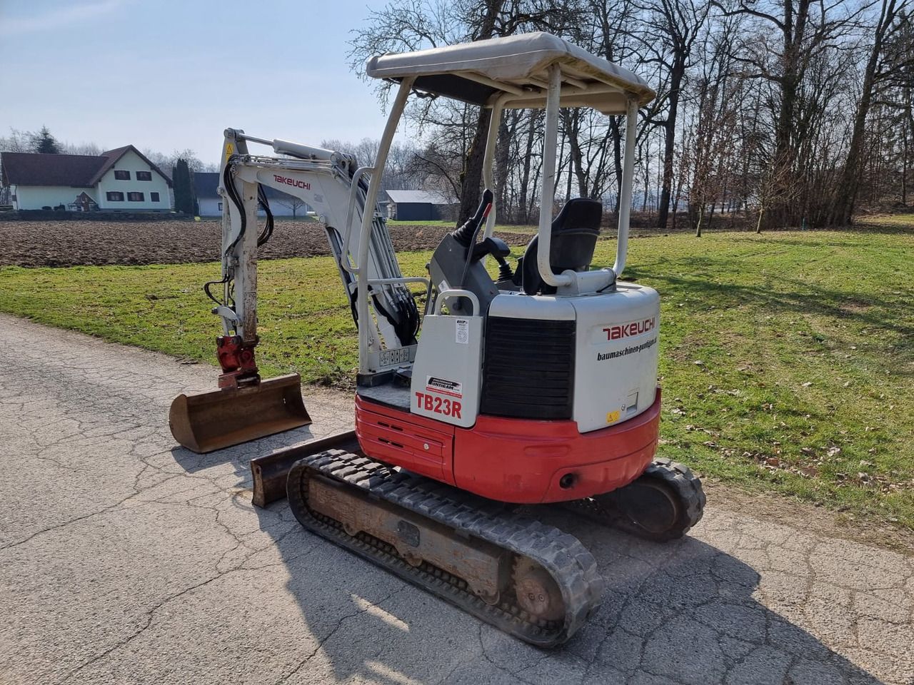 2018 Takeuchi TB23R mini excavator, rear three-quarter view