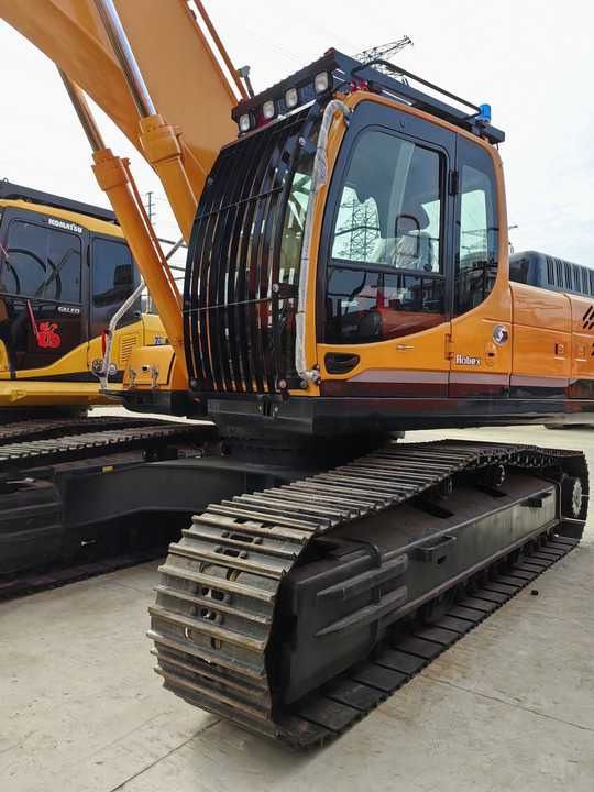 2023 Hyundai R305LC-9T crawler excavator, side view of cab and tracks
