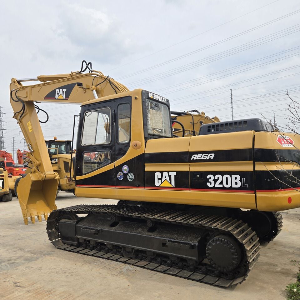 1998 Caterpillar 320BL crawler excavator side view