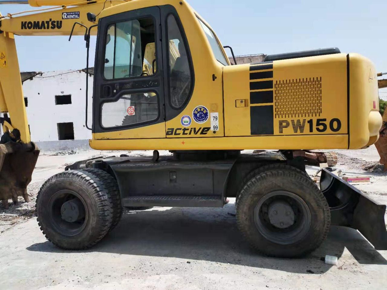 2015 Komatsu PW150-6 wheeled excavator side view