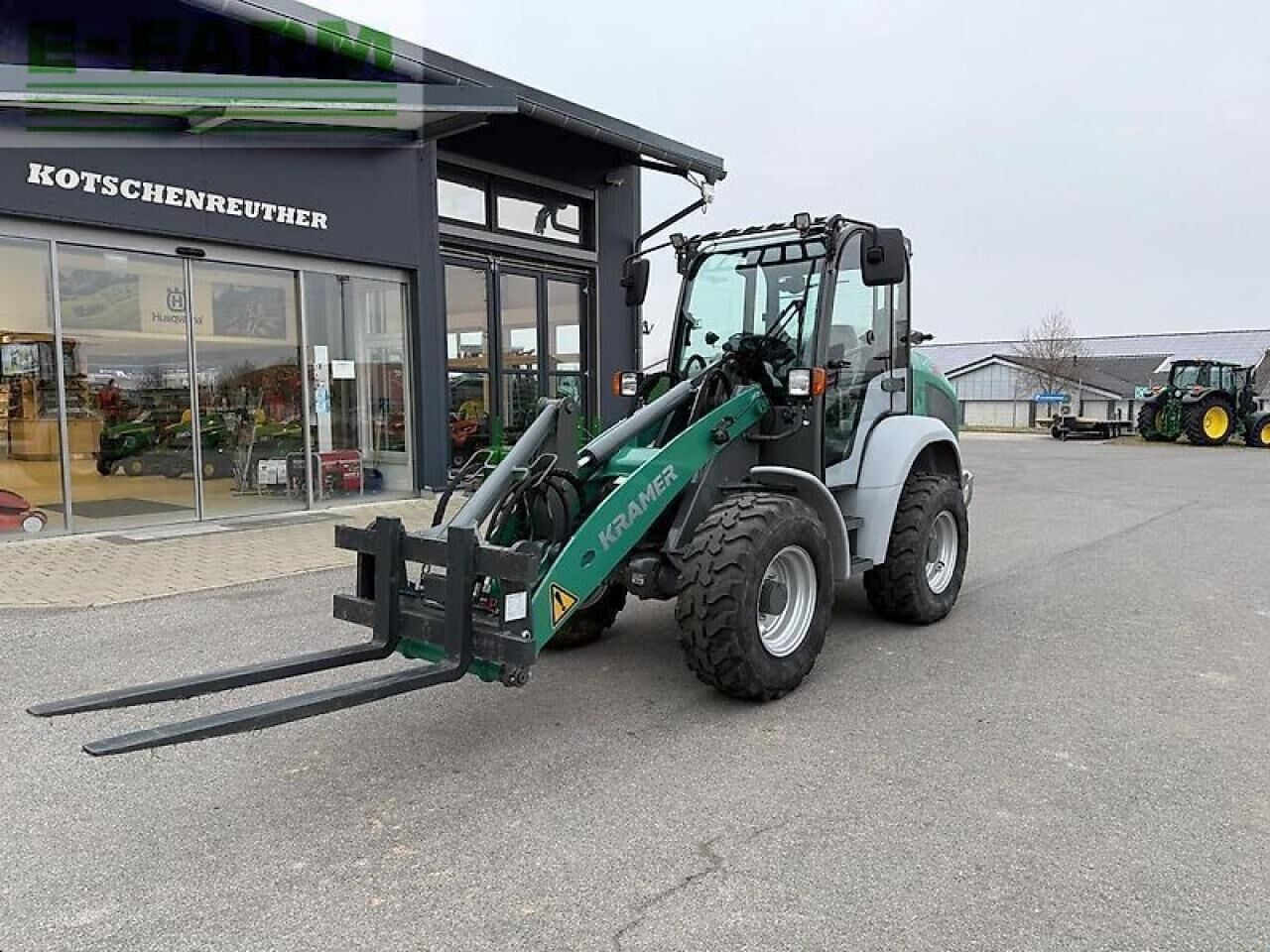 2023 Kramer KL255 wheel loader with pallet forks, front three-quarter view 2023 Kramer KL255 wheel loader with pallet forks, front three-quarter view