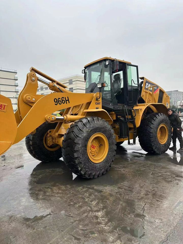 2020 Caterpillar 966H wheel loader, front three-quarter view 2020 Caterpillar 966H wheel loader, front three-quarter view