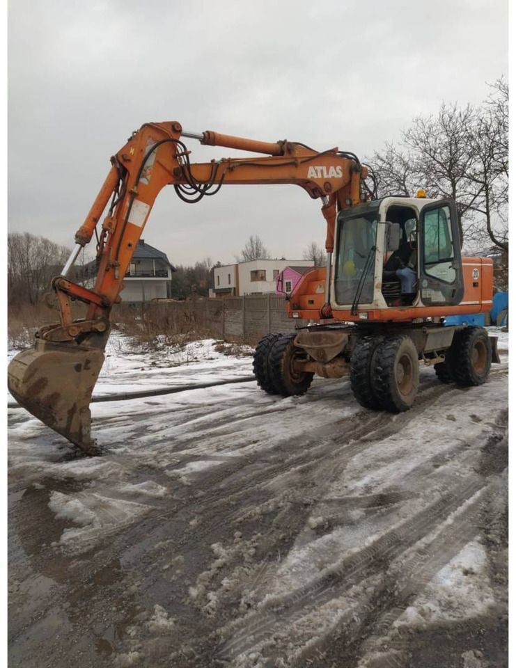 2001 Atlas 1404K wheel excavator, side view