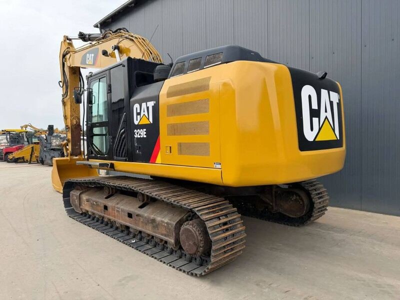 2011 Caterpillar 329E crawler excavator, rear three-quarter view