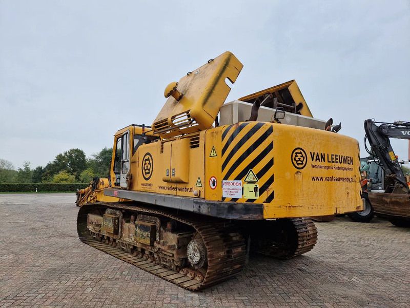 PMI Woltman 955LC crawler excavator, rear three-quarter view