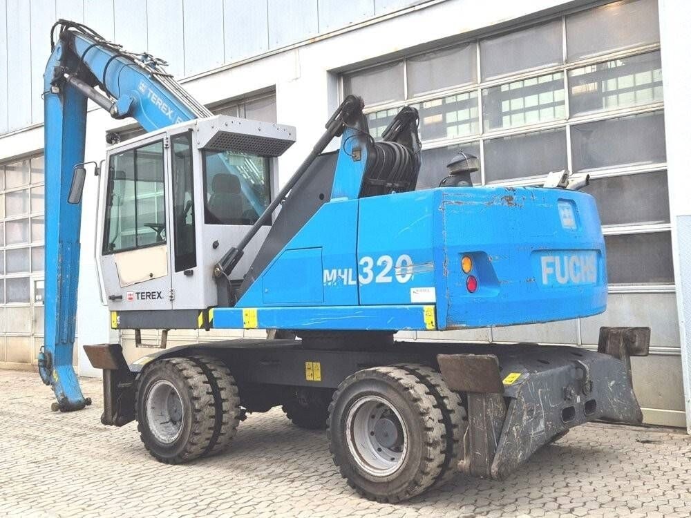 Manipulateur de matériaux Fuchs MHL320D 2016, vue arrière trois-quarts