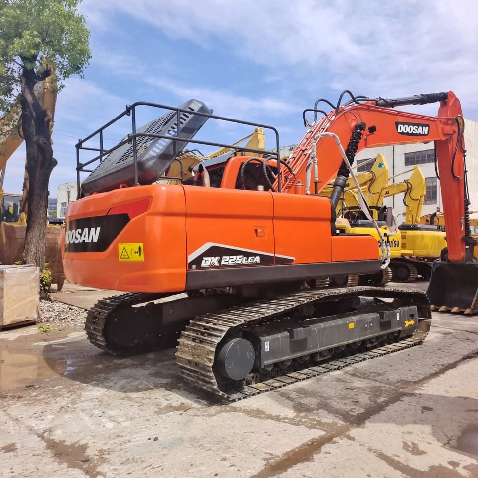 2024 Doosan DX225LCA crawler excavator, rear three-quarter view