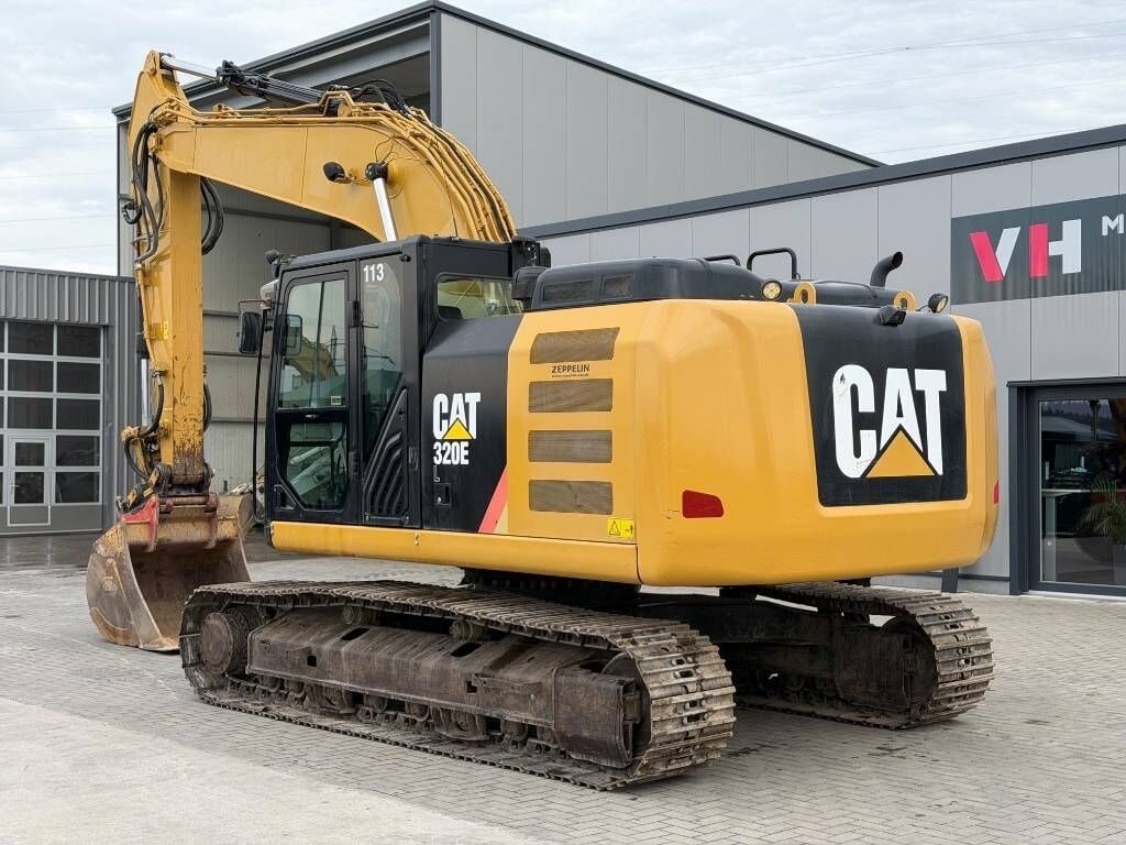 2016 Caterpillar 320E crawler excavator, rear three-quarter view