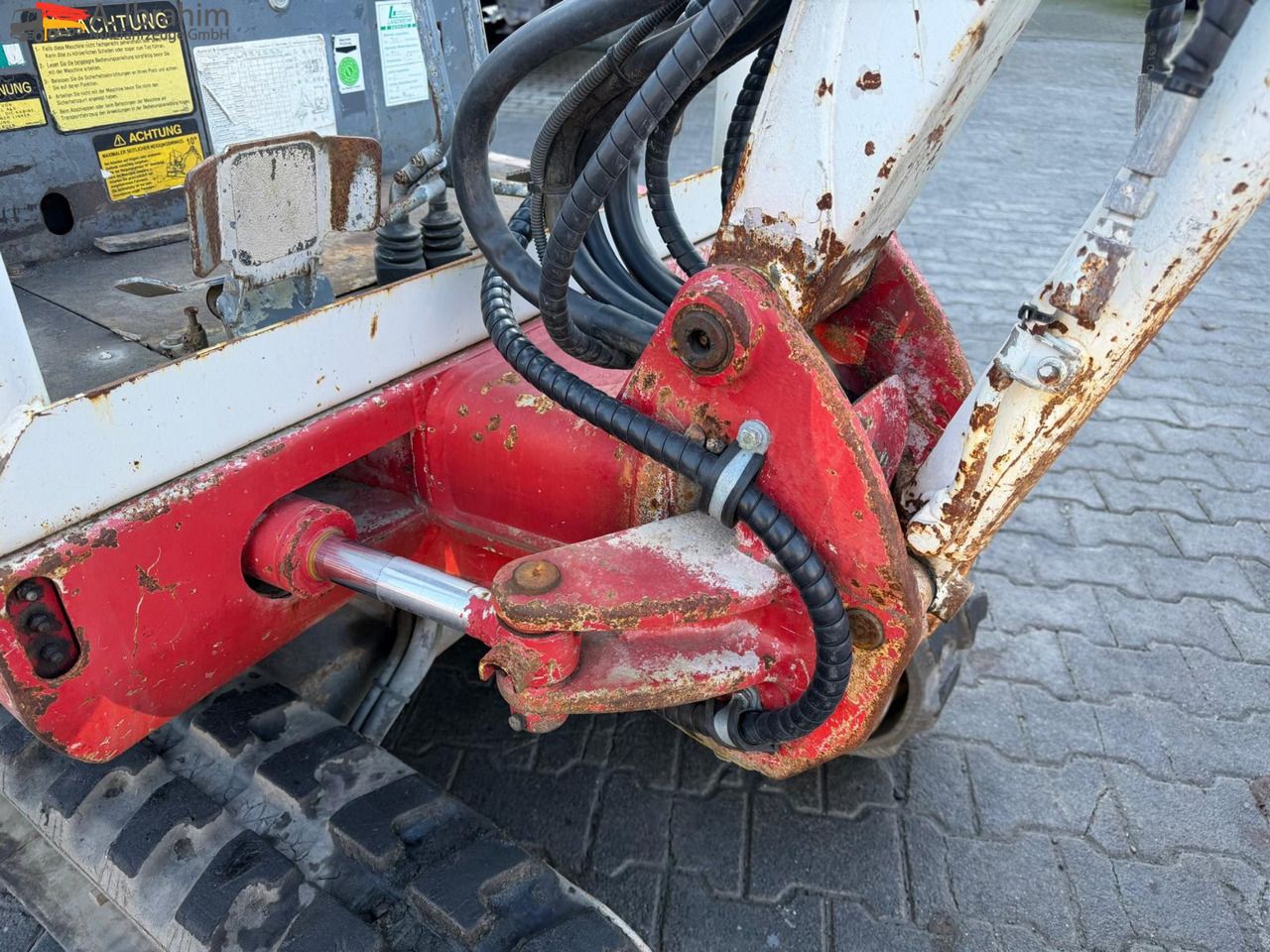 2009 Takeuchi TB014 mini excavator boom and swing cylinder detail