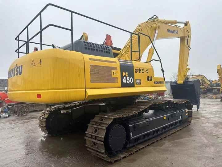 Komatsu PC450-7 crawler excavator, rear three-quarter view