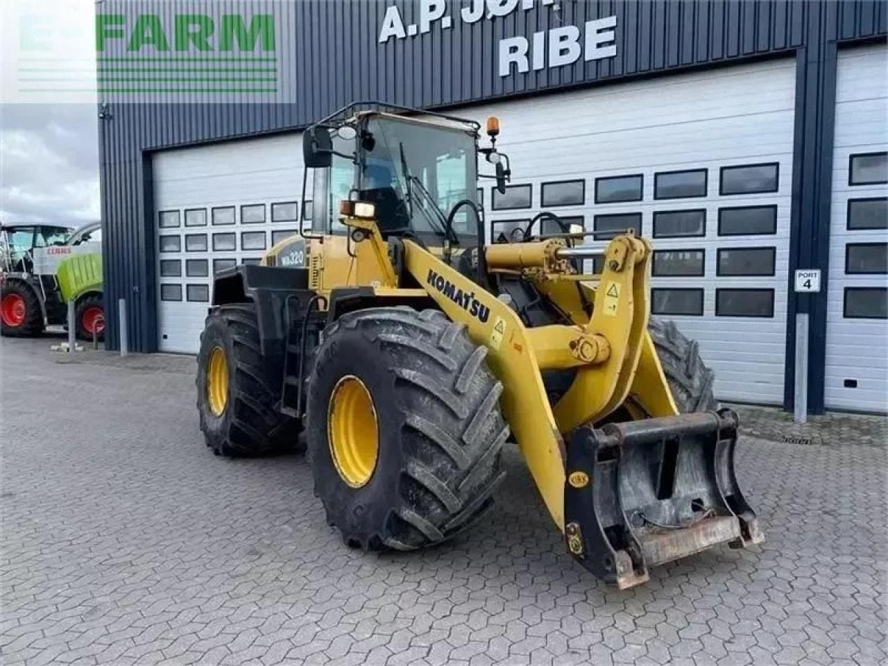 2007 Komatsu WA320-5 wheel loader, front three-quarter view