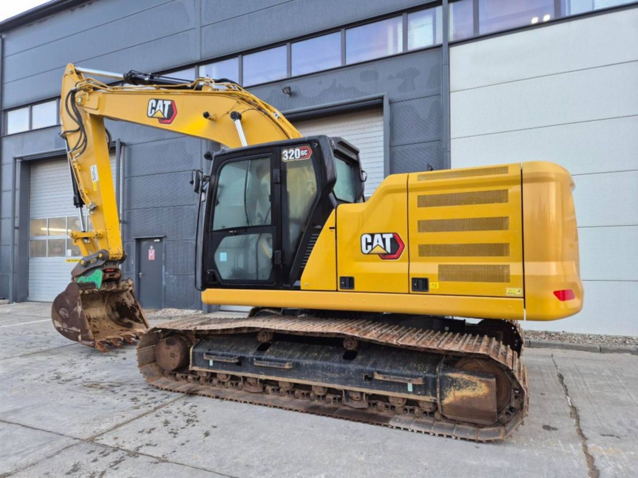2023 Caterpillar 320GC crawler excavator side view