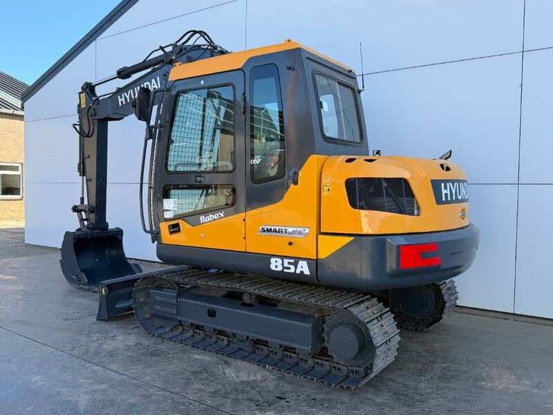 2026 Hyundai R85A Crawler Excavator showing the right side of its orange body and the '85A' model marking. 2026 Hyundai R85A Crawler Excavator showing the right side of its orange body and the '85A' model marking.