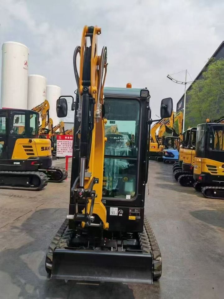 2025 Sany SY20C Crawler Excavator from the front, showing the boom and arm in a raised position