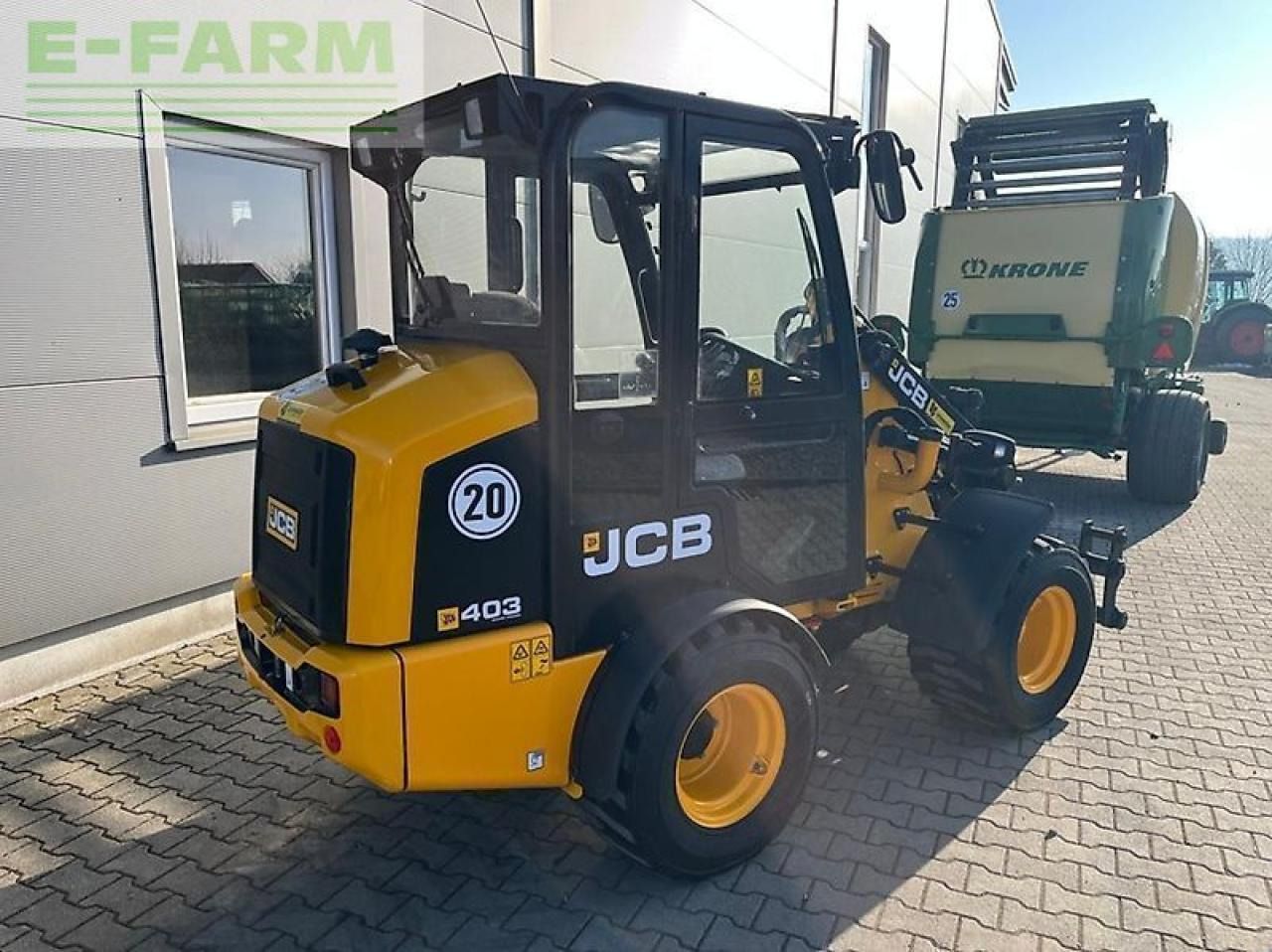 2023 JCB 403 AGRI wheel loader, rear three-quarter view 2023 JCB 403 AGRI wheel loader, rear three-quarter view