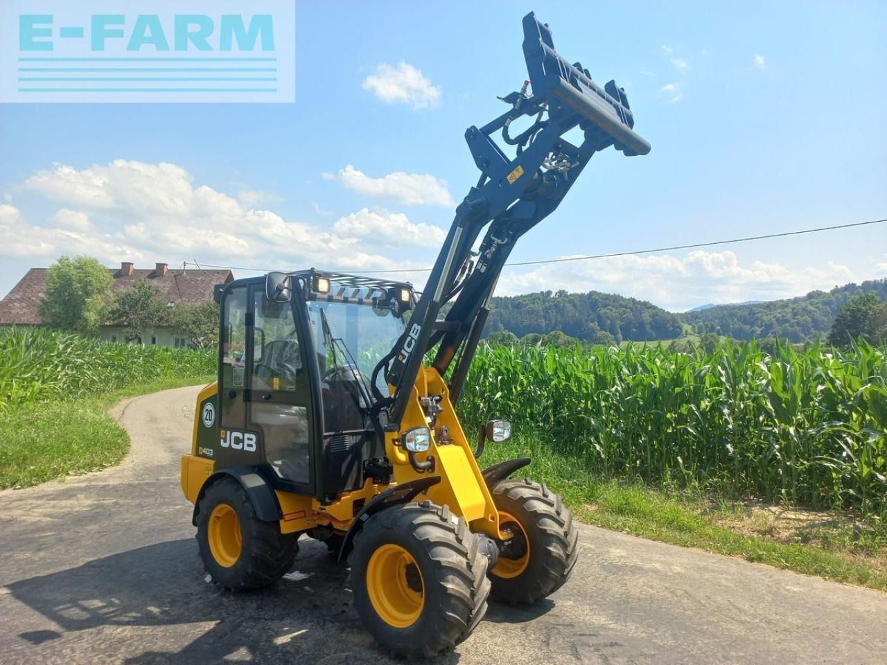 2024 JCB 403 AGRI mini excavator, front three-quarter view