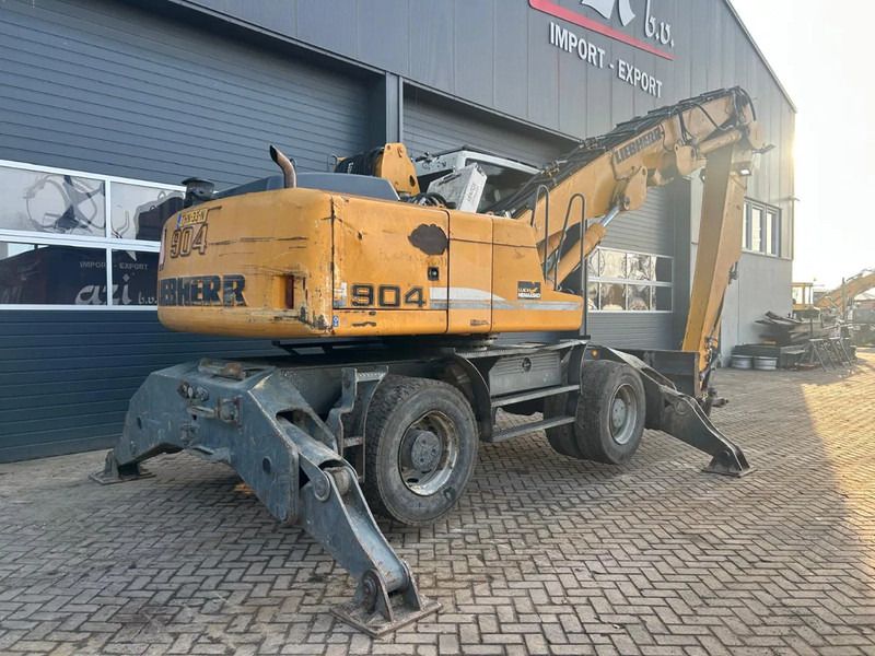 2010 Liebherr A904 C material handler, rear three-quarter view