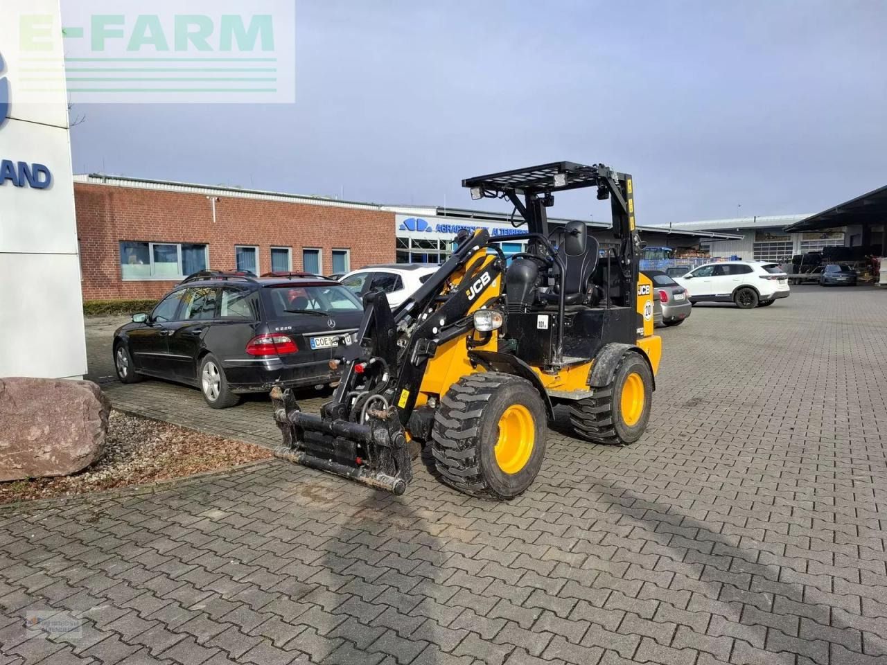 2024 JCB 403PLUS mini excavator, front three-quarter view