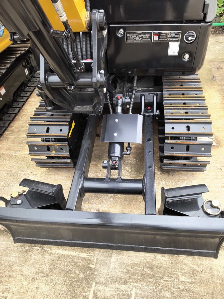 Sany SY16C Mini Excavator, rear view of dozer blade and tracks