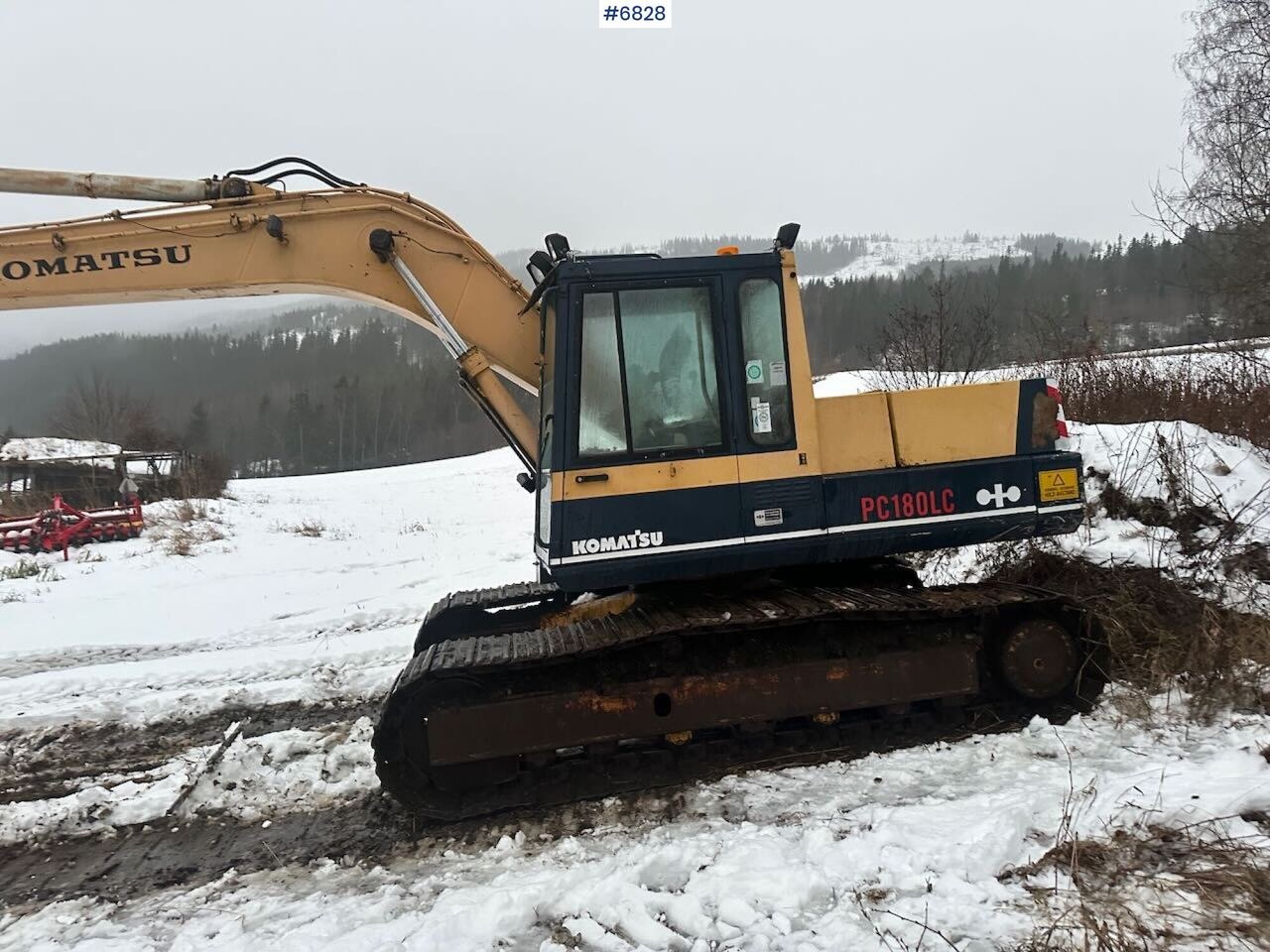 Komatsu PC180LC-3 excavator side view Komatsu PC180LC-3 excavator side view