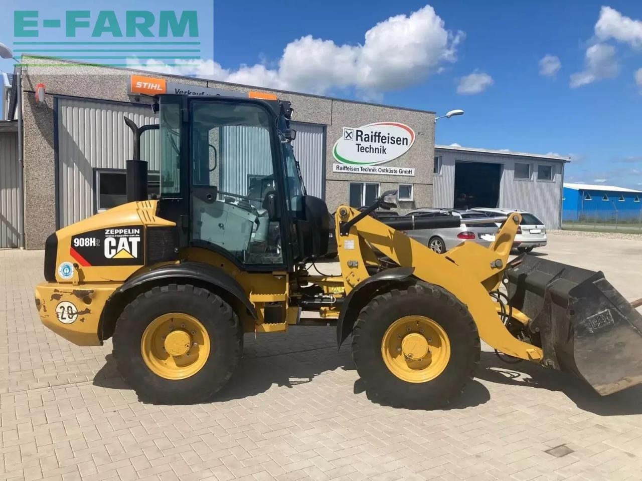 2013 Caterpillar 908H2 wheel loader, side view