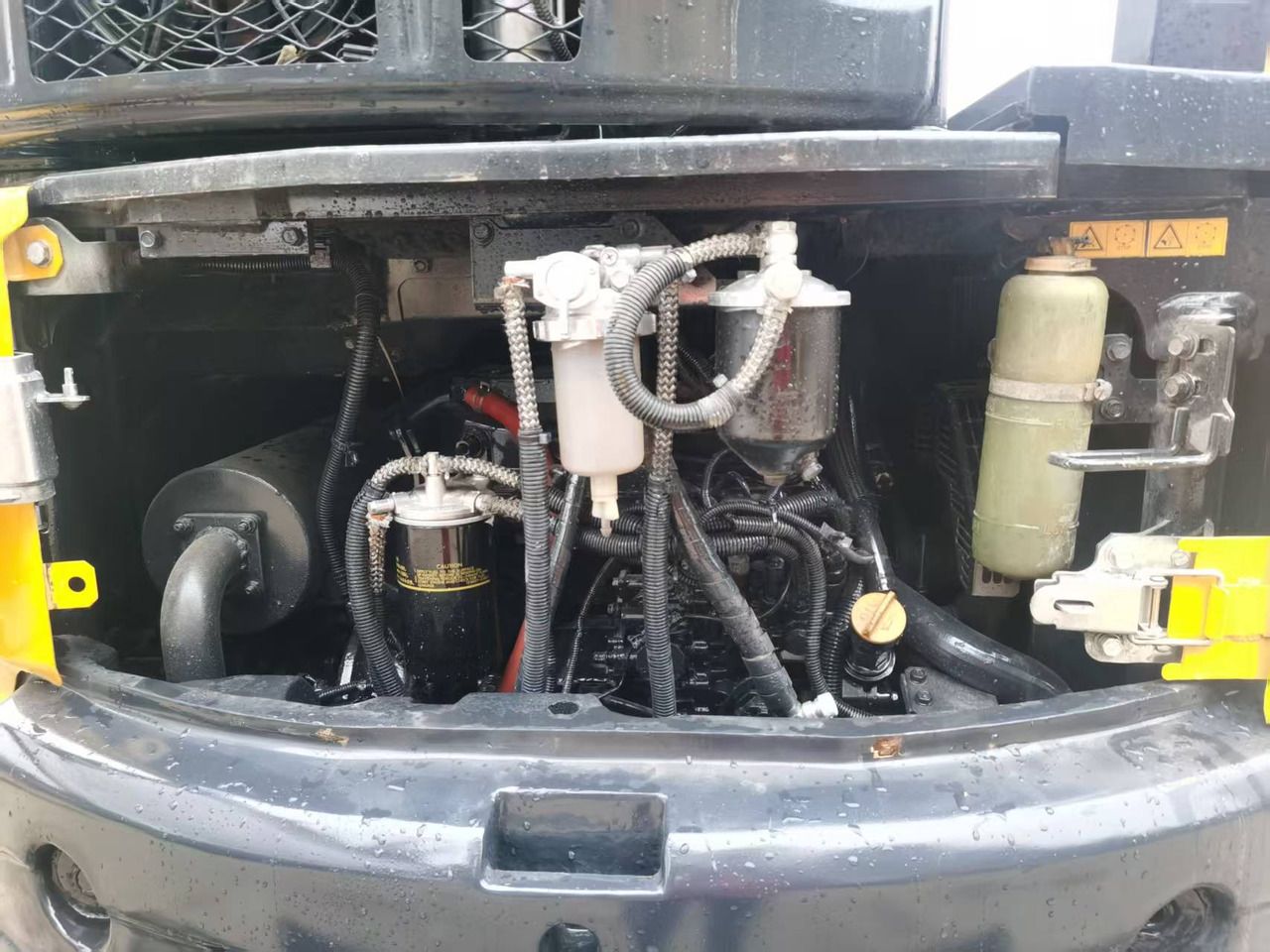 2022 Yanmar VIO55-6B Mini Excavator with a close-up view of the engine bay components.