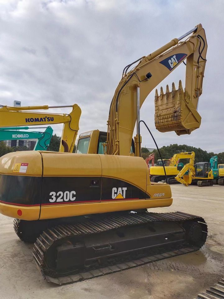 2018 Caterpillar 320C crawler excavator, rear three-quarter view
