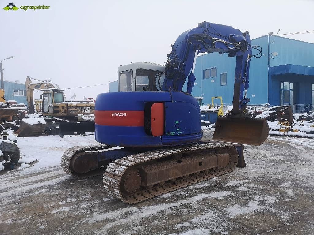 2002 Hitachi EX 135 UR crawler excavator, rear three-quarter view