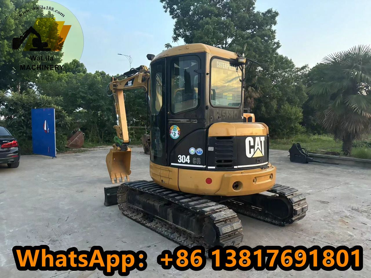 2010 Caterpillar 304 CR mini excavator, rear three-quarter view
