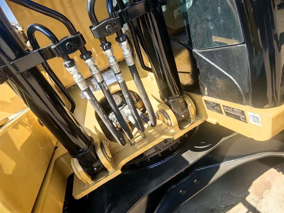2022 Caterpillar 312D2 crawler excavator hydraulic boom connection detail