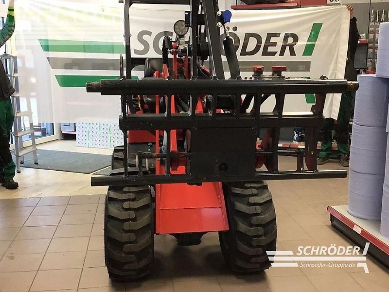 2024 Schäffer 2028-2 mini excavator, front view with attachment 2024 Schäffer 2028-2 mini excavator, front view with attachment