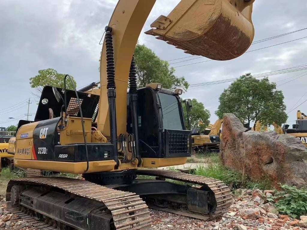 2023 Caterpillar 323D crawler excavator, side view