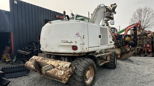 2005 CASE WX165 wheel excavator, rear three-quarter view