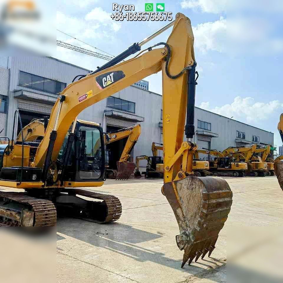 2020 Caterpillar 313D crawler excavator, front three-quarter view