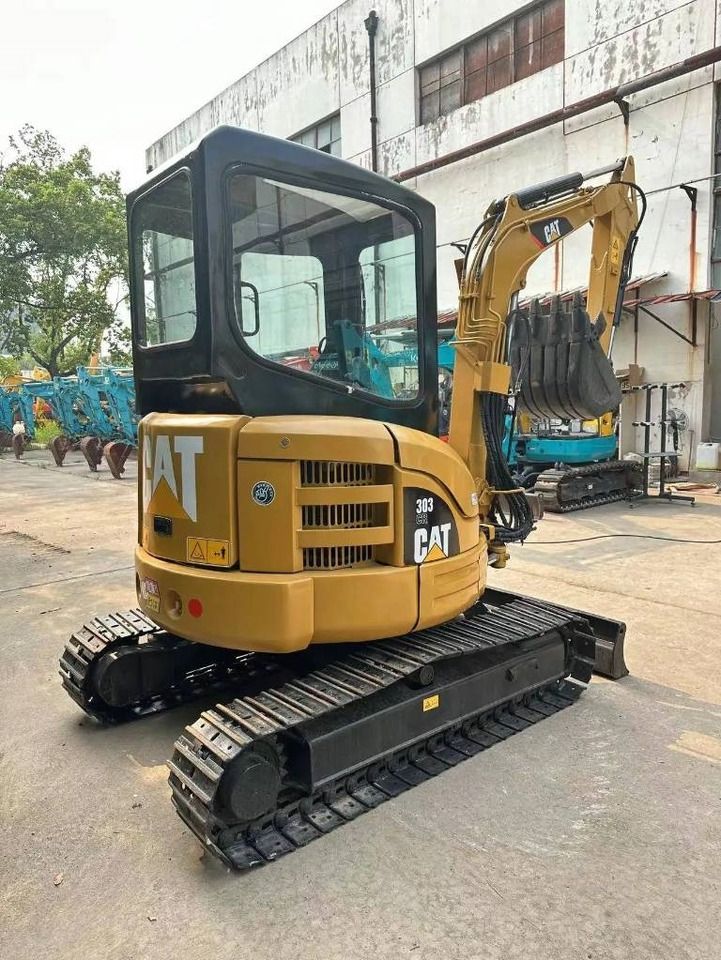 2020 Caterpillar 303 CR mini excavator, rear three-quarter view