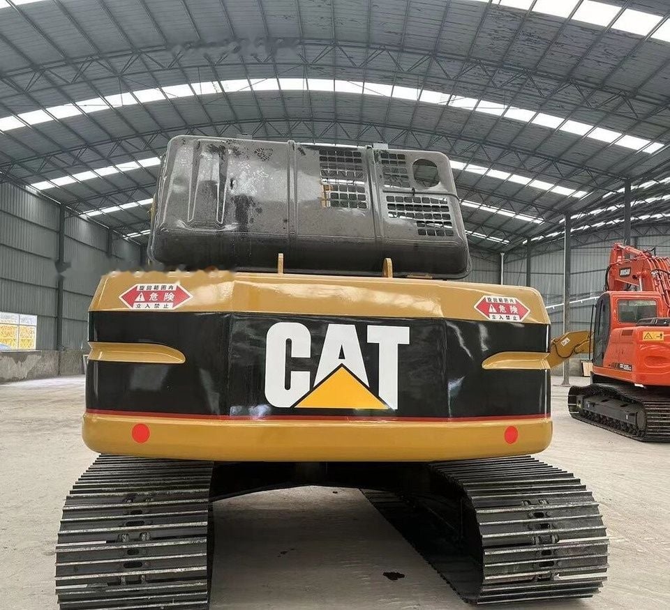 Caterpillar 320BL crawler excavator rear view Caterpillar 320BL crawler excavator rear view