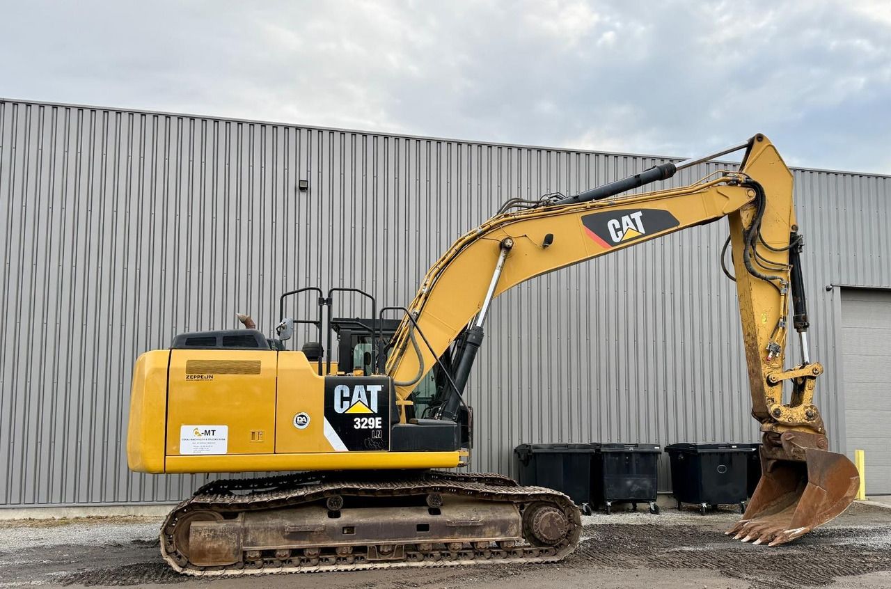 2012 Caterpillar 329E LN crawler excavator, side view